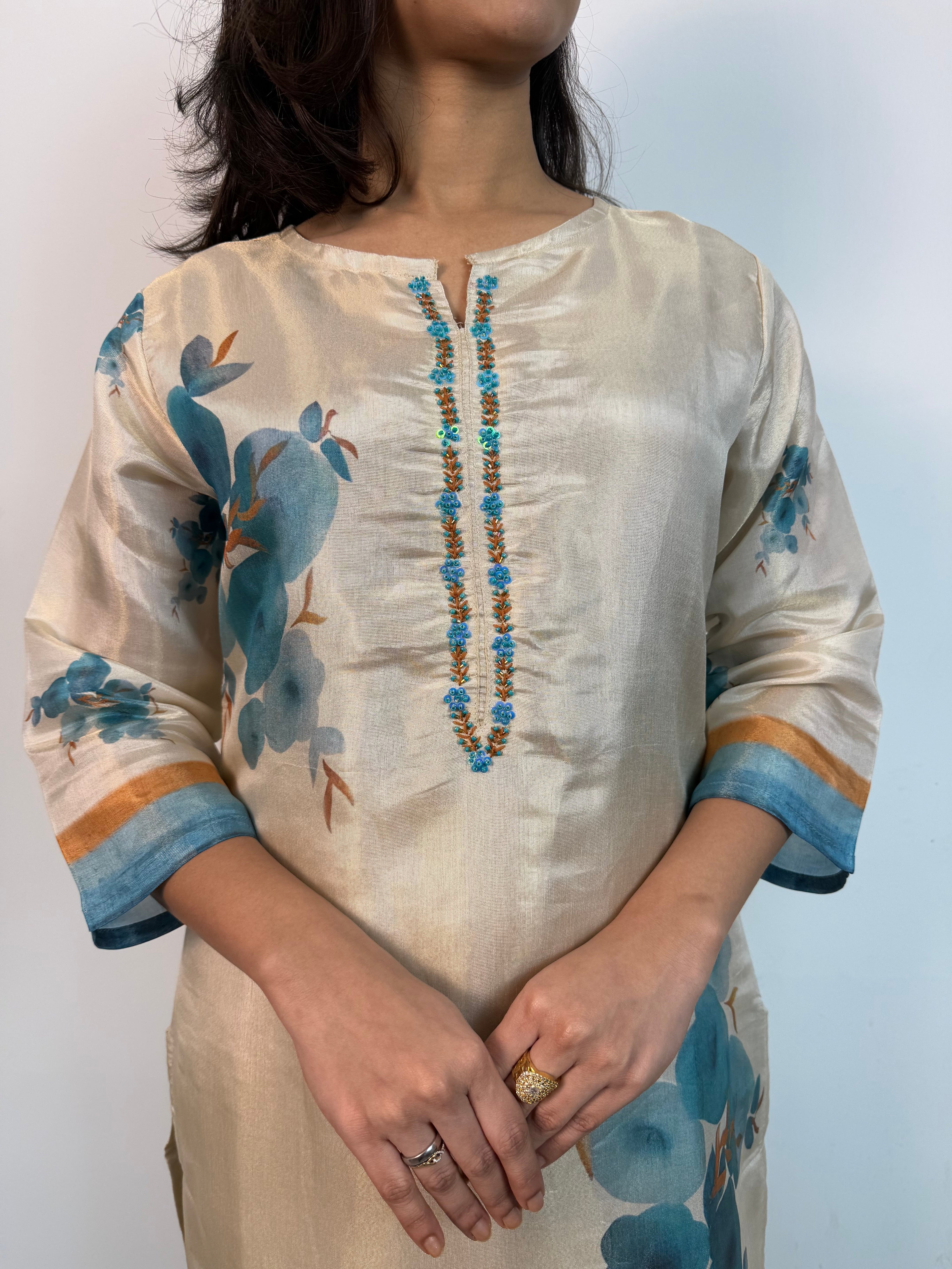 Shraddha Tissue silk suit